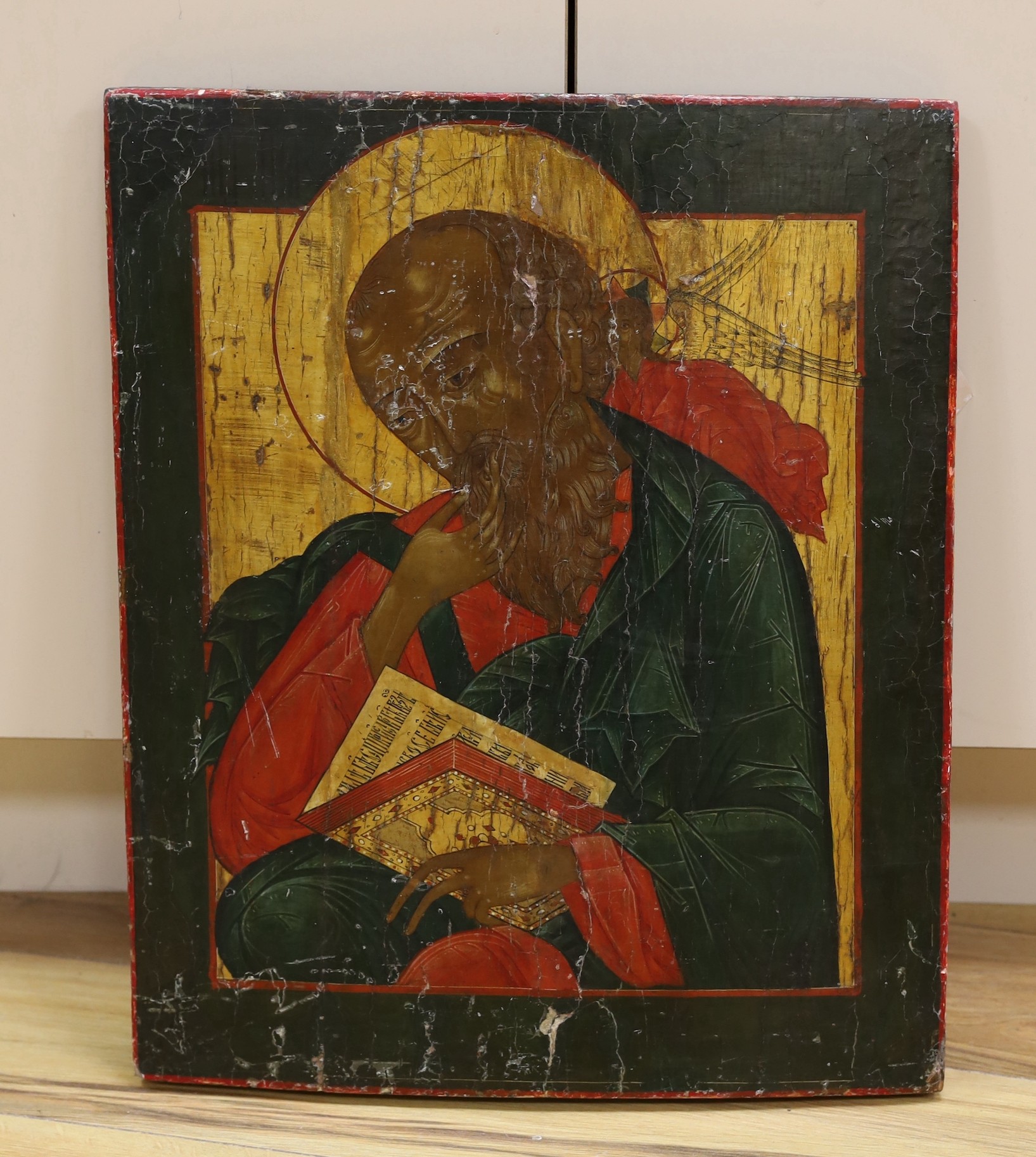 19th Century Russian School, tempera on wooden panel, Icon of St John the Evangelist, Maria Andipa label verso, 51 x 43cm